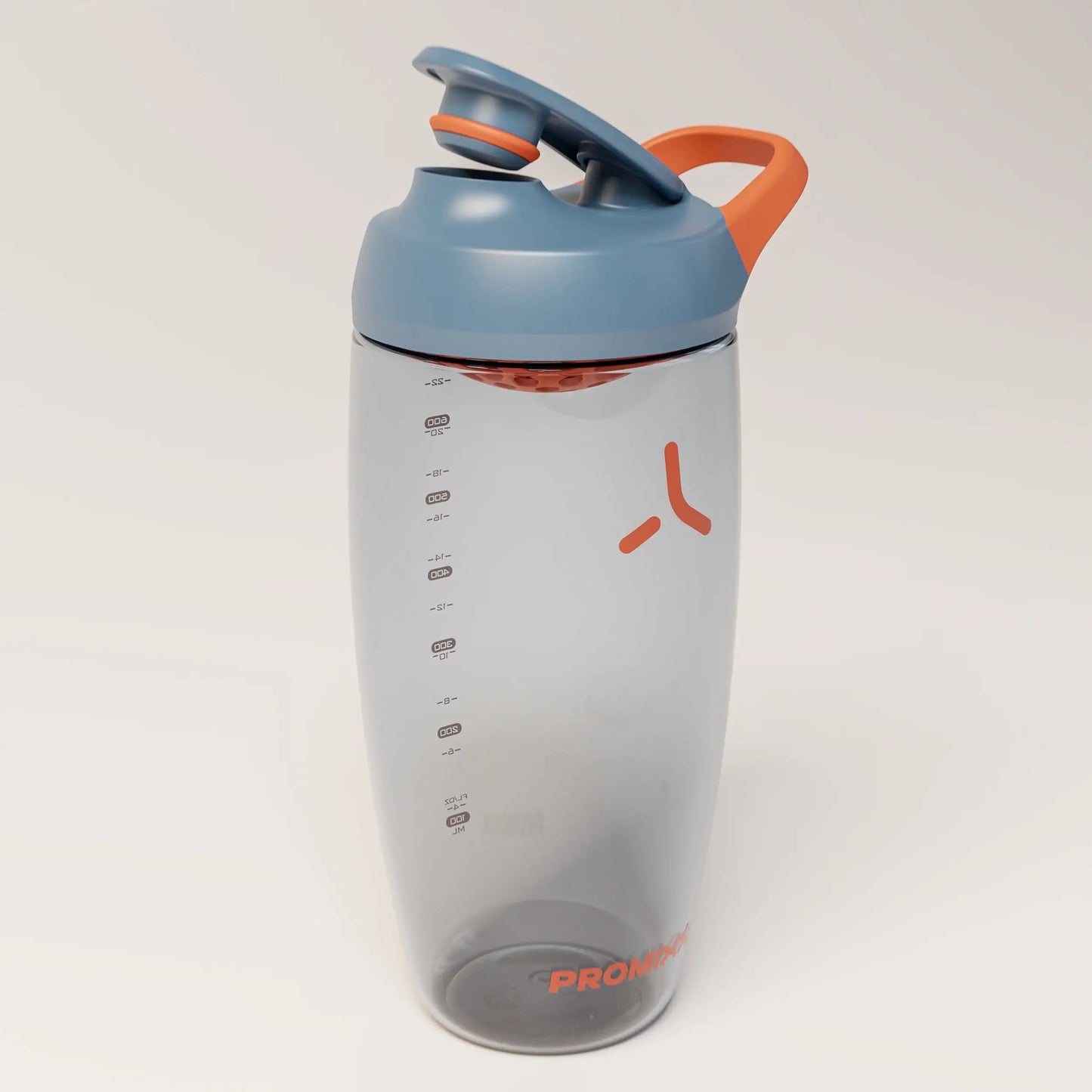 ecozen-performance-shaker-bottle-d9 SHKR_24700_P-S1.1_midnightBlue_burntOrange_2_3_highLeft_edit.png