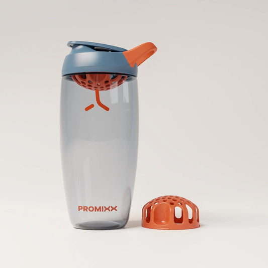 ecozen-performance-shaker-bottle-d9 SHKR_24700_P-S1_heroAgitatorFloor_midnightBlue_burntOrange_1_1_hero_edit.png